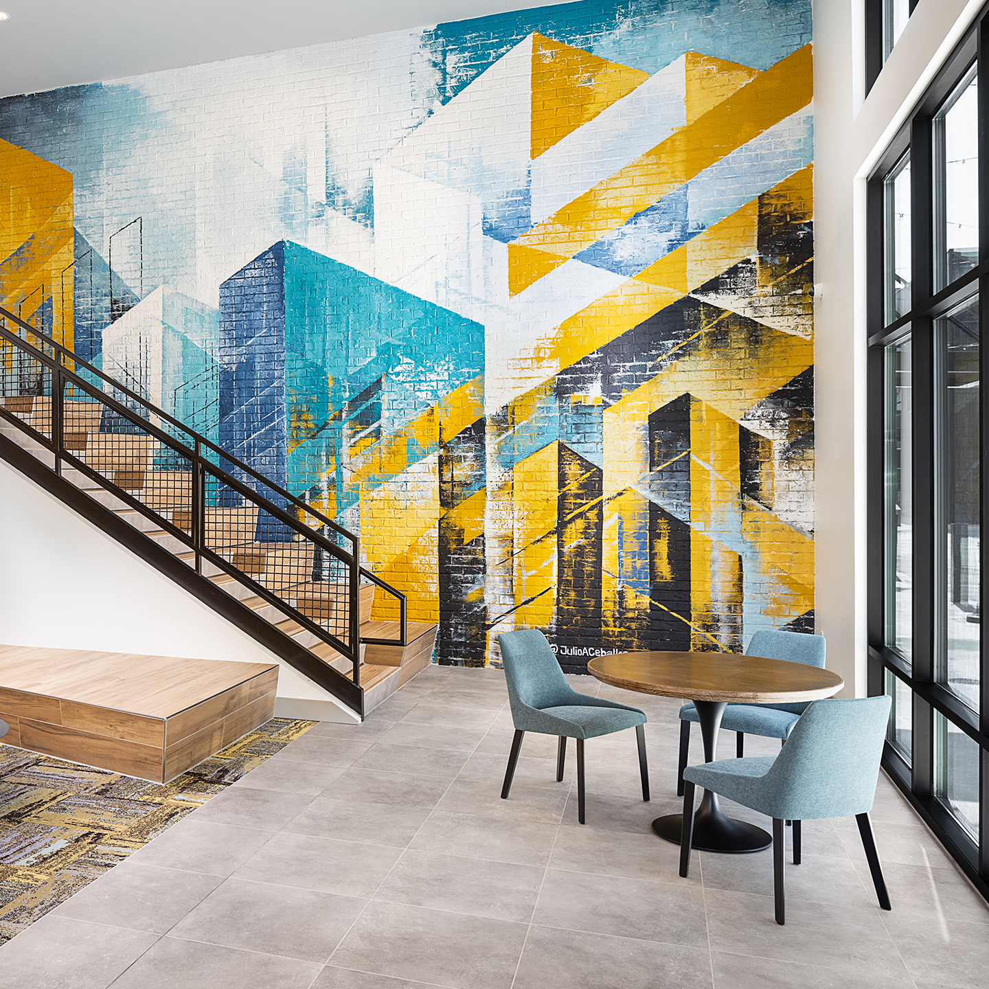 A mural with blue and yellow shapes