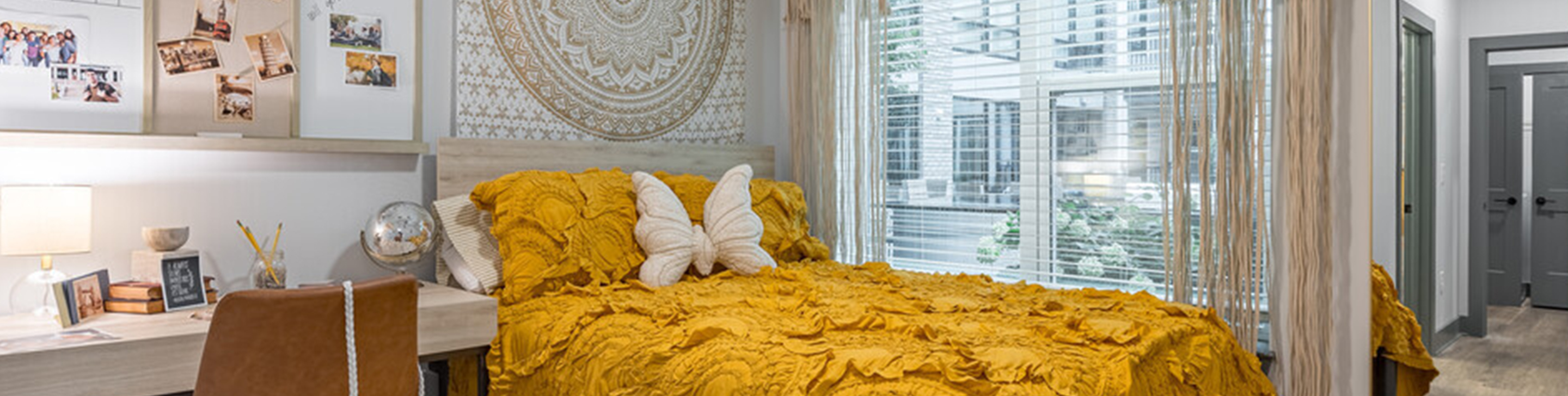 A bedroom with a yellow bed