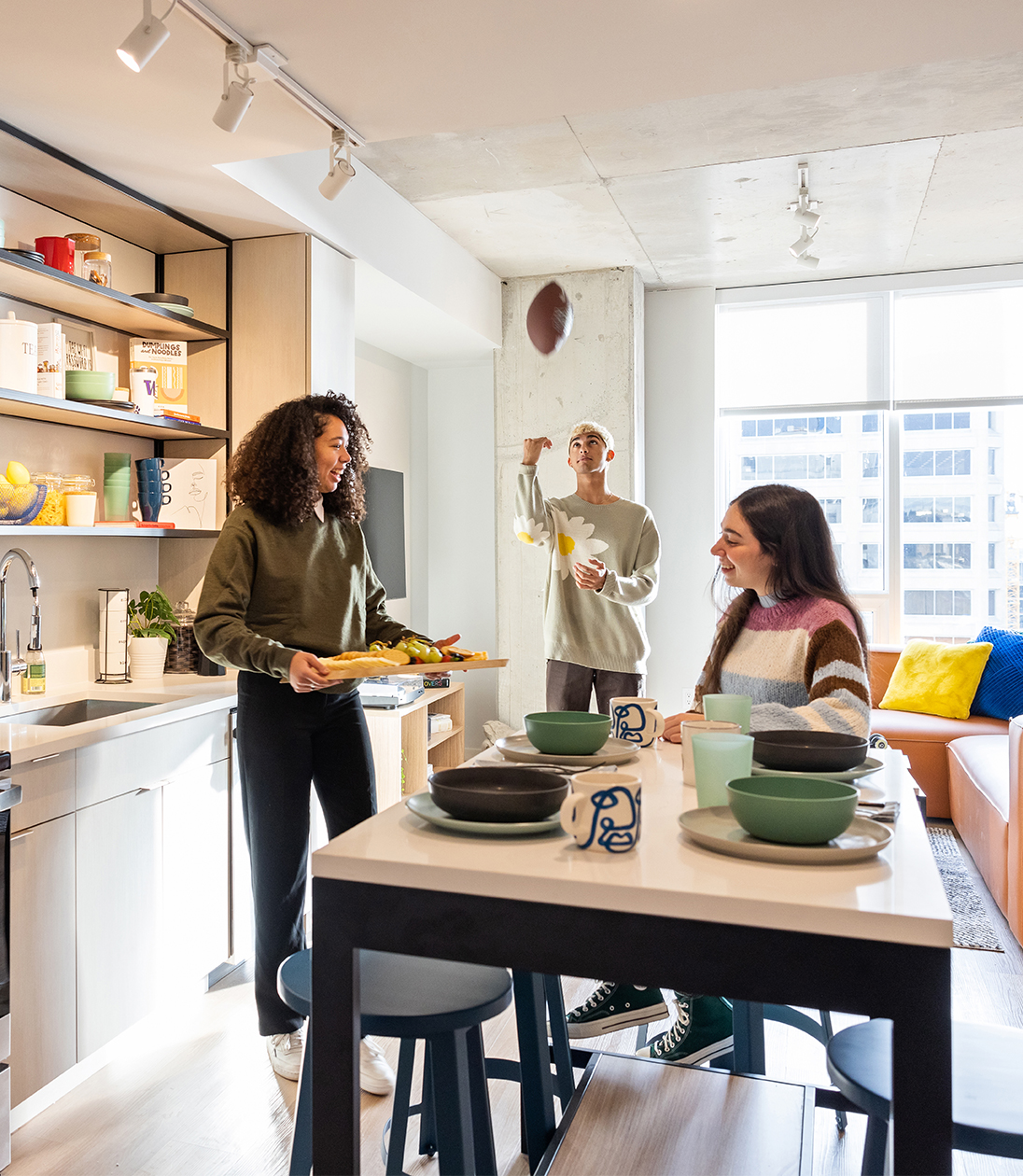 A group of friends in the kitchen